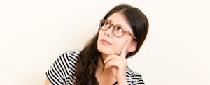 Young, puzzled woman wants to learn about credit score factors