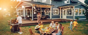 Big Family and Friends Celebrating Outside at Home.